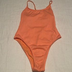 NEW. Size medium but probably can fit as a medium or small